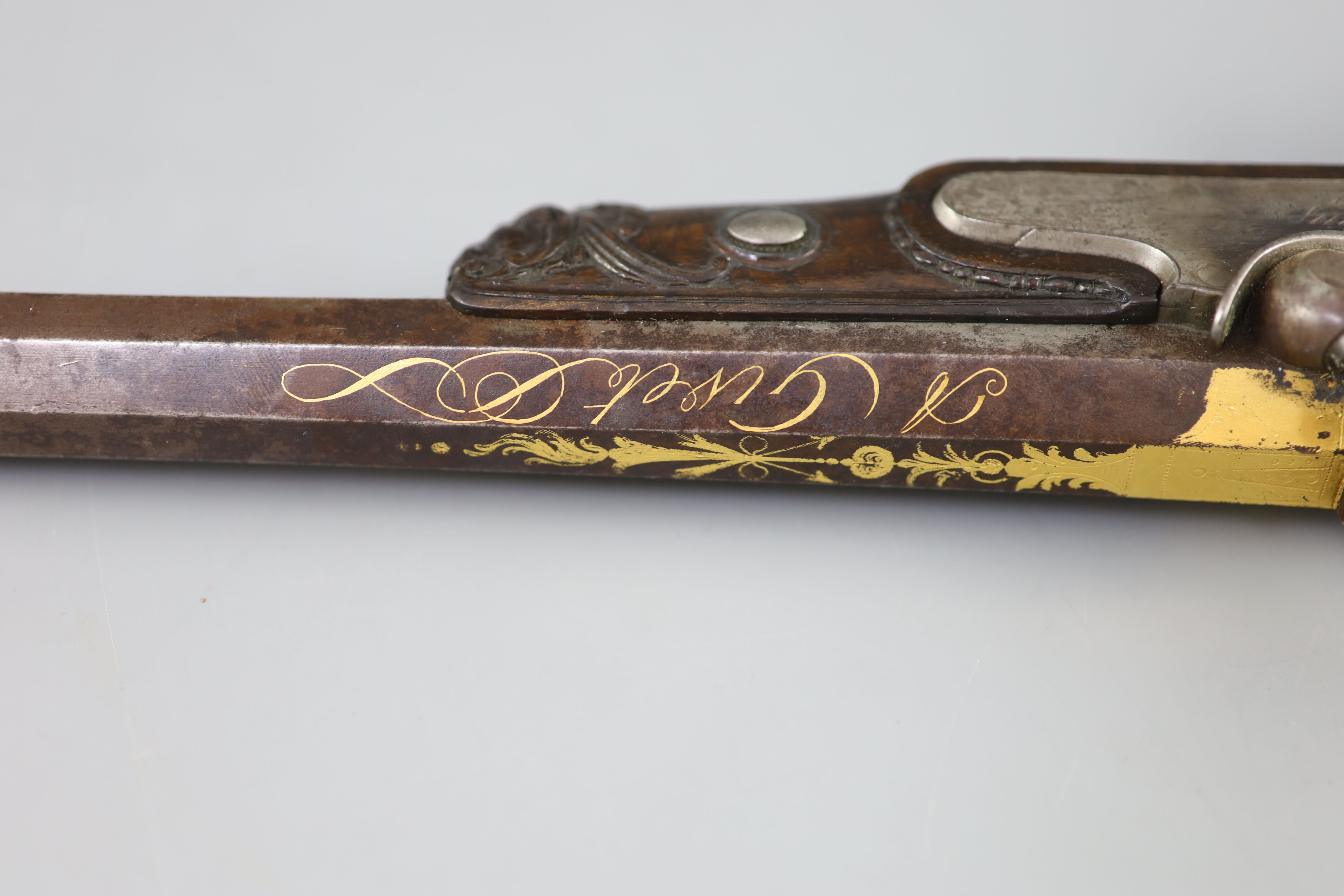 A late 18th/ early 19th century French gold inlaid pistol by Henraux 14.5in.